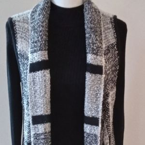Body length sweater vest